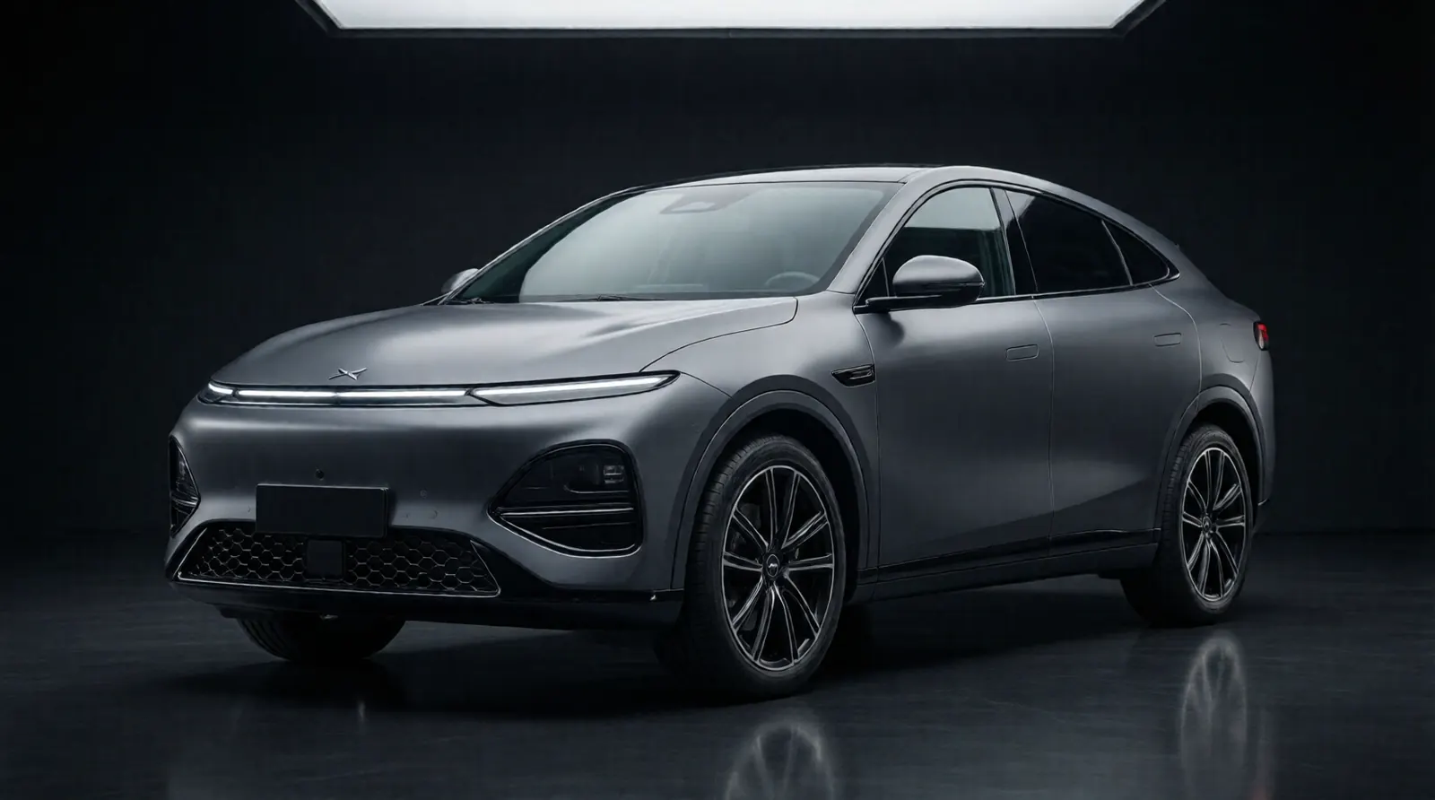Grey Xpeng G6 in the studio, front three-quarter view